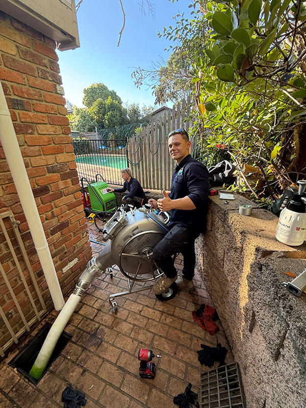 Specialist drain repair plumbers at work